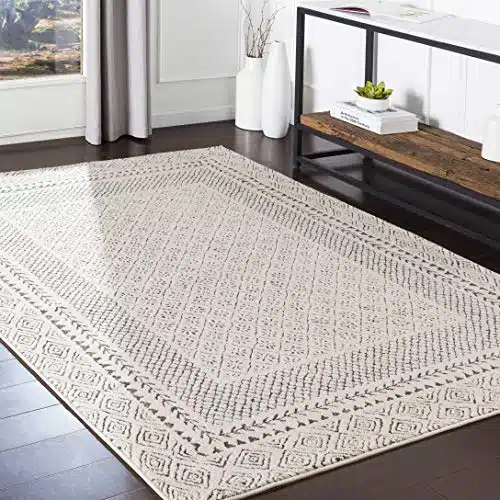 This rug measures 5 ft 3 in (width) x 7 ft 3 in (length). This piece features intricate carving to create a unique high/low texture Designed to withstand everyday wear, this rug is kid approved and pet friendly. Perfect for high traffic areas of your home such as living room, dining room, kitchen, and hallways